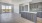 a kitchen with dark cabinets