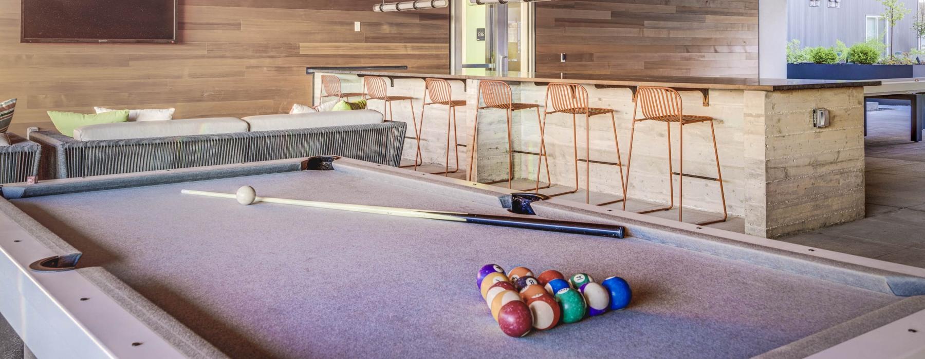 billiards table under covered outdoor lounge
