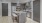 kitchen with island and bar stools
