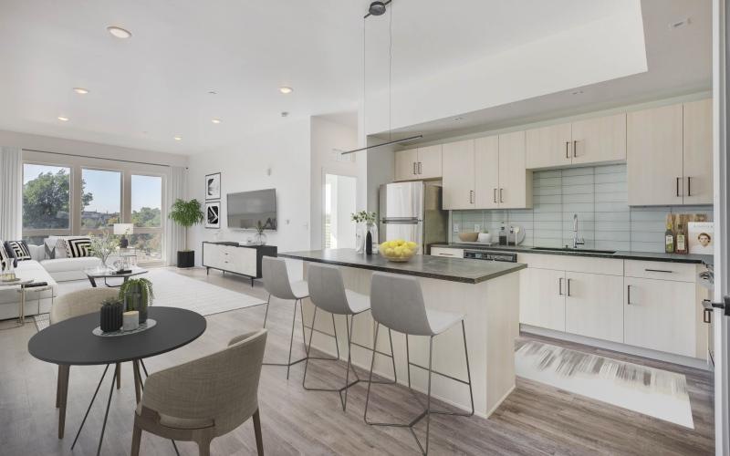 spacious kitchen open to living and dining areas