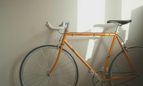 a bicycle parked in a room